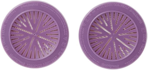 Two purple Honeywell North 7580P100 cartridge air filter discs on a white background