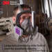 Person wearing a 3M 6800 respirator mask in a workshop setting